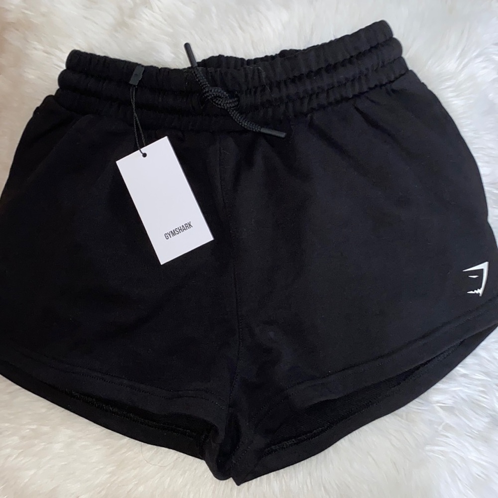 Never worn women’s gym shark shorts with tags